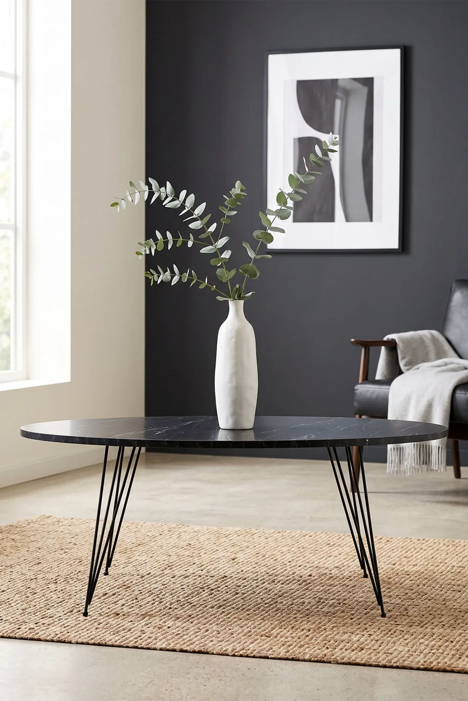 Table basse ovale à pieds en fil - effet marbre noir