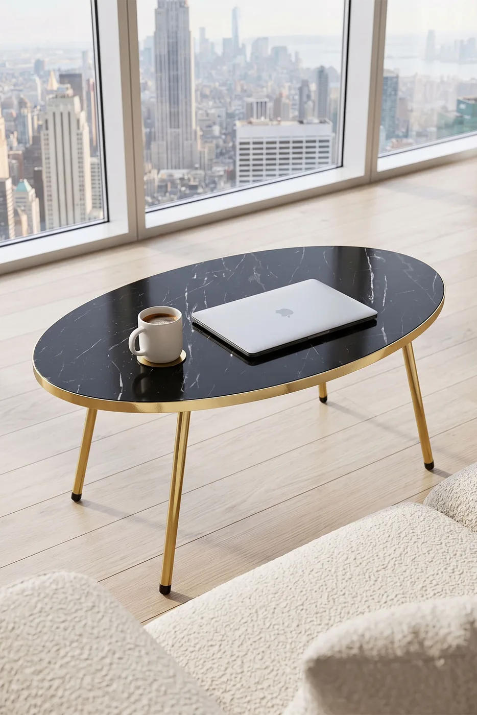 Table basse ovale pieds en métal doré - effet marbre noir